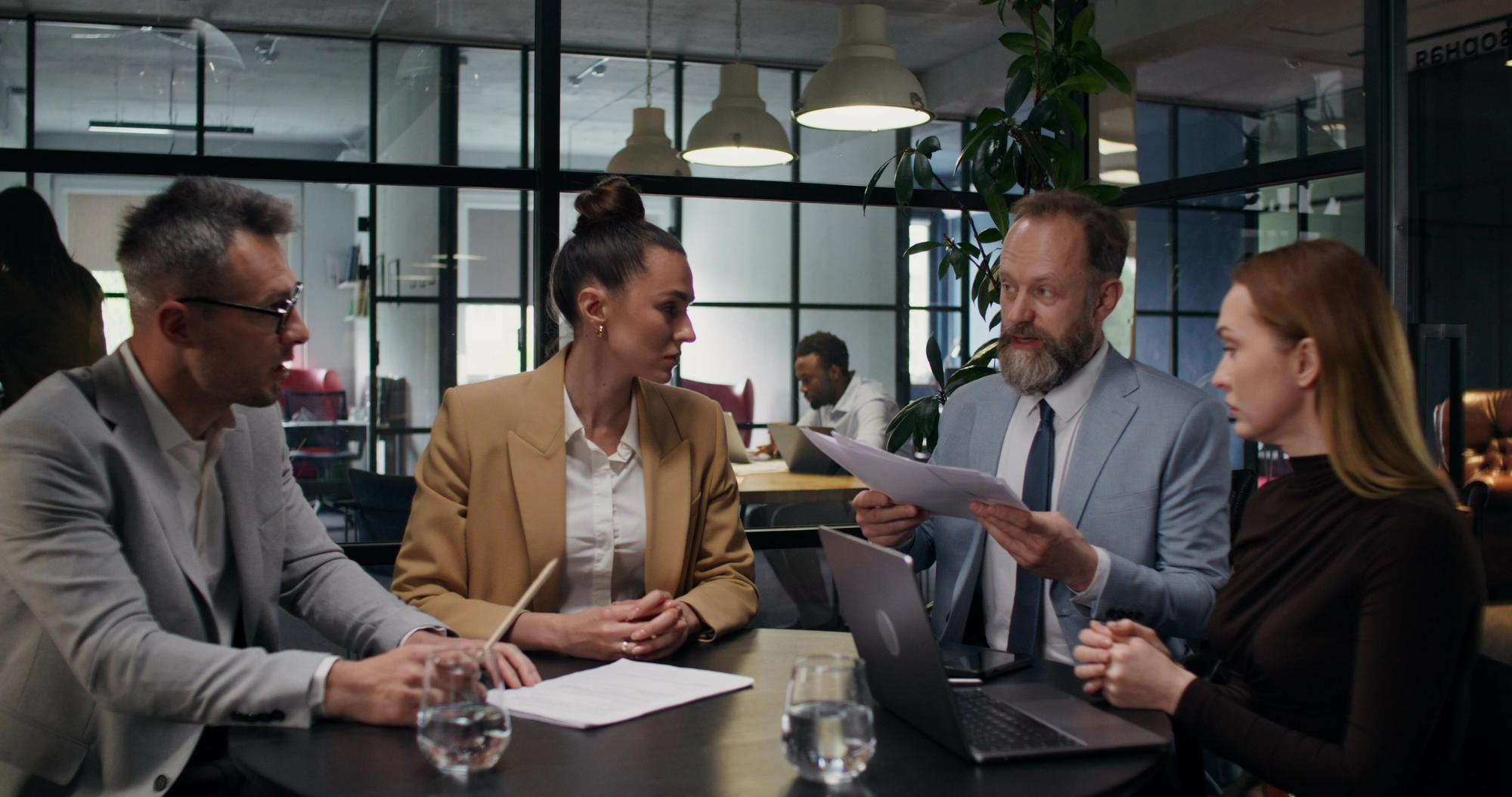 Colleagues in discussion in a modern office