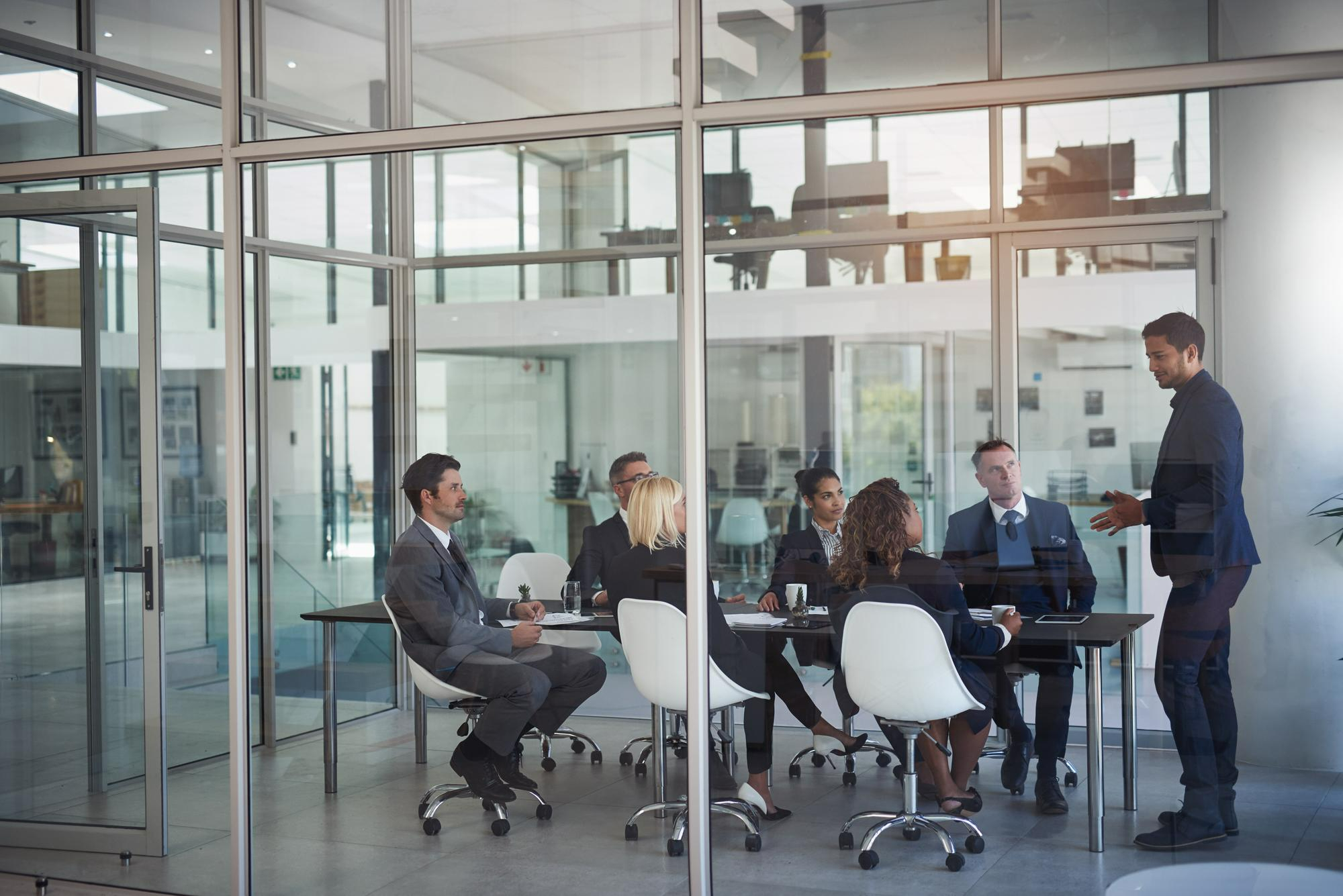 Colleagues in discussion in a modern office